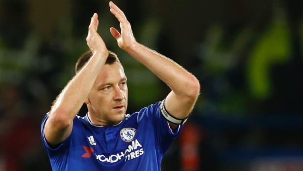 Chelsea captain John Terry applauds the home fans after their 3-1 win over Sunderland at Stamford Bridge