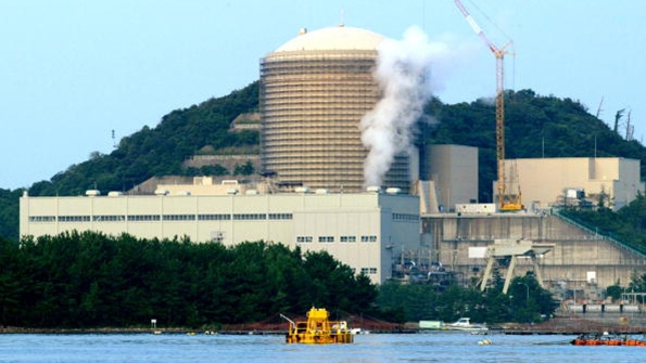 Steam rises from the No. 3 reactor of the nuclear plant in Mihama Japan