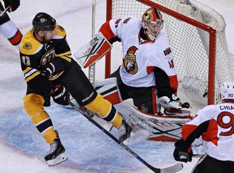 12/29/15 Boston MA The Bruins Jimmy Hayes beats Senators goalie Craig Anderson in the first period to put Boston ahead 1-0. The Boston Bruins hosted the Ottawa Senators in a regular season NHL hockey game at the TD Garden. (Globe Staff