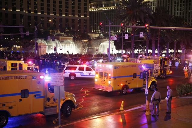 Police and emergency crews respond to the scene of the accident along the Las Vegas Strip on Sunday