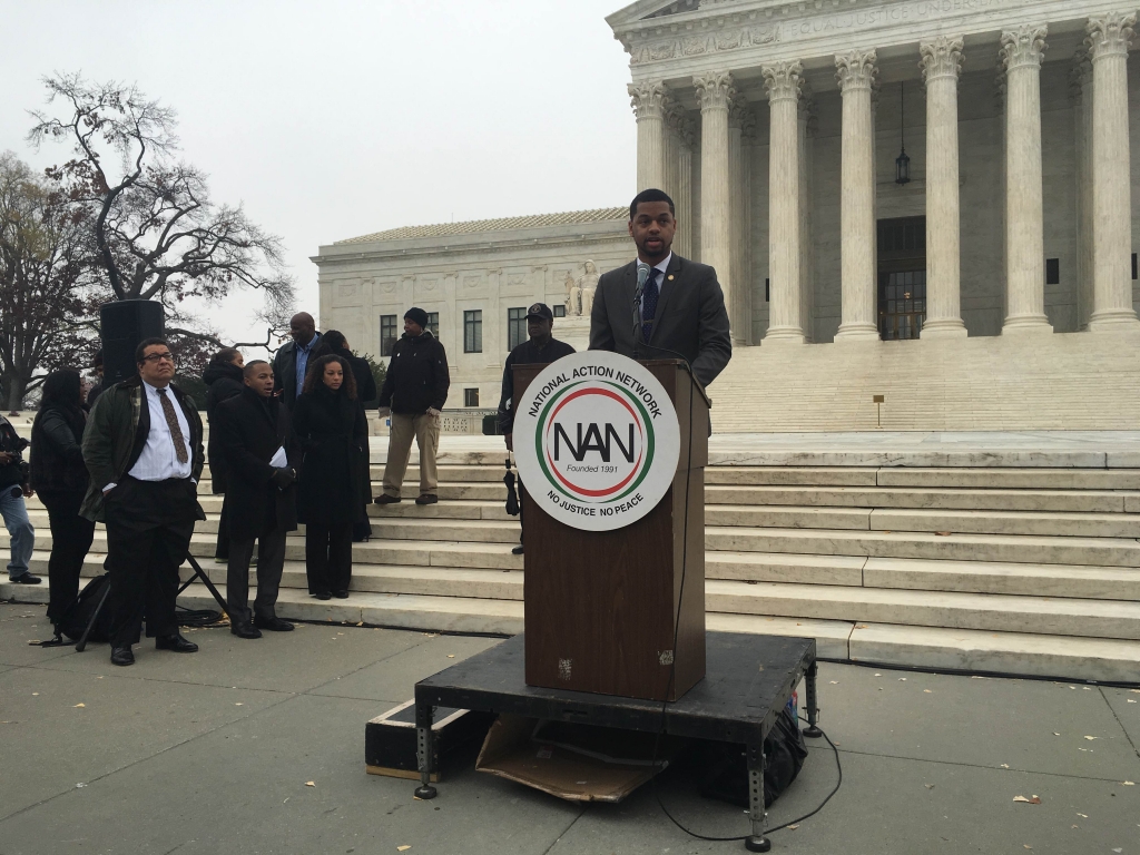 David McDonald a senior at UT Austin addresses affirmative action supporters outside the Supreme Court after oral arguments