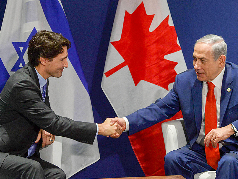 Justin Trudeau left meets Benjamin Netanyahu in Paris