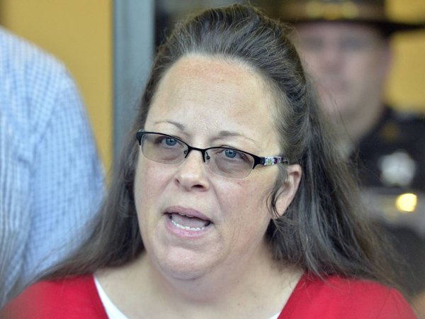 Rowan County Clerk Kim Davis makes a statement to the media at the front door of the Rowan County Judicial Center in Morehead Ky. when she announced that her office will issue marriage licenses under order of a