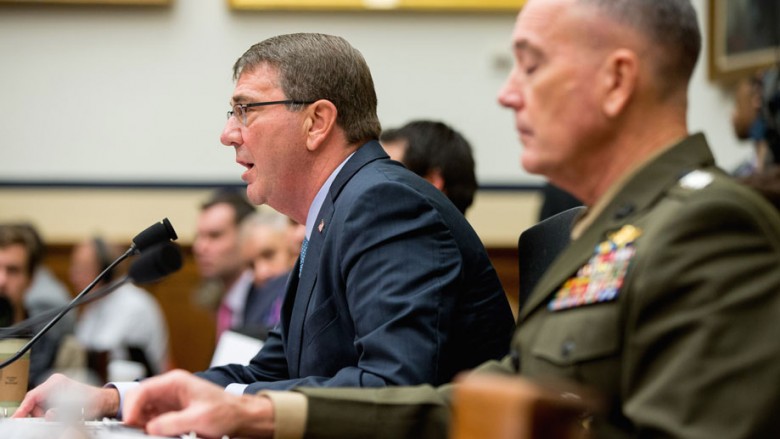 Defense Secretary Ash Carter left accompanied by Joint Chiefs Chairman Gen. Joseph Dunford Jr. testifies on Capitol Hill in Washington Tuesday Dec. 1 2015 before the House Armed Services Committee hearing on the U.S. Strategy for Syria and Iraq and