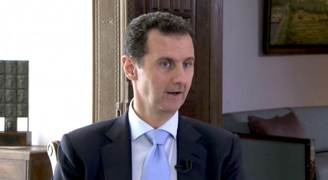 Step down or face forcible removal, Assad told