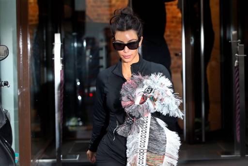 Kim Kardashian walks out of a gym centre