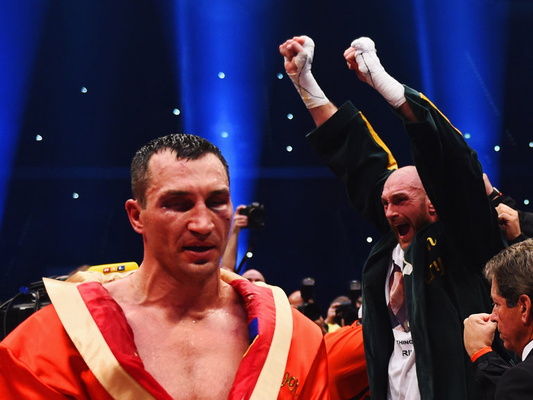 Tyson Fury celebrates as he defeats Wladimir Klitschko