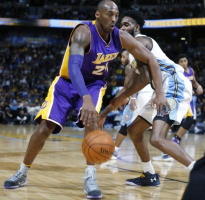 Los Angeles Lakers forward Kobe Bryant. left drives