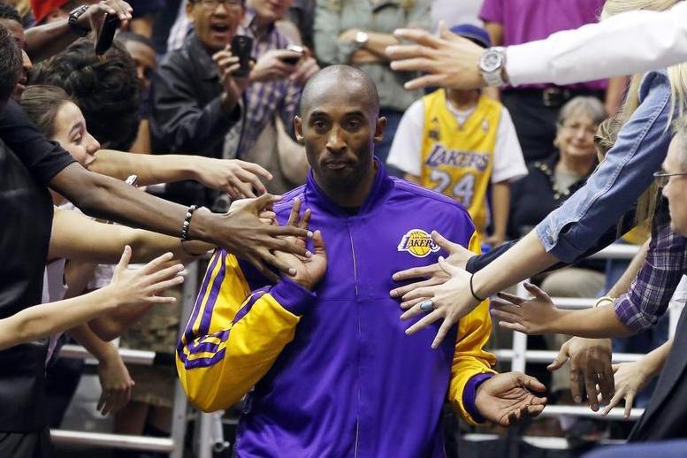 Kobe Bryant says showing the fans you want to win championships is a sure-fire way to win them over