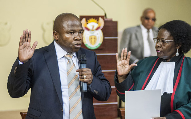 Jacob Zuma South Africa's president center watches as David van Rooyen South Africa's incoming finance minister left is sworn into office by judge Sisi Virginia Khampepe at the Union Buildings in Pretoria