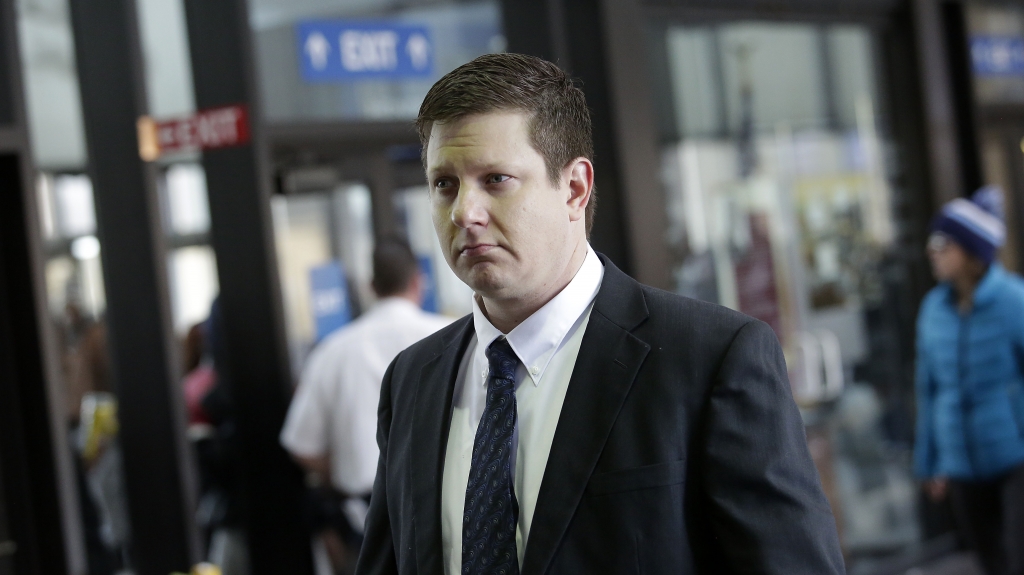 Chicago police Officer Jason Van Dyke who was charged with murder last month in the shooting death of Laquan McDonald arrives at the Cook County Criminal Court for a status hearing on Dec. 18. Joshua Lott  Getty Images