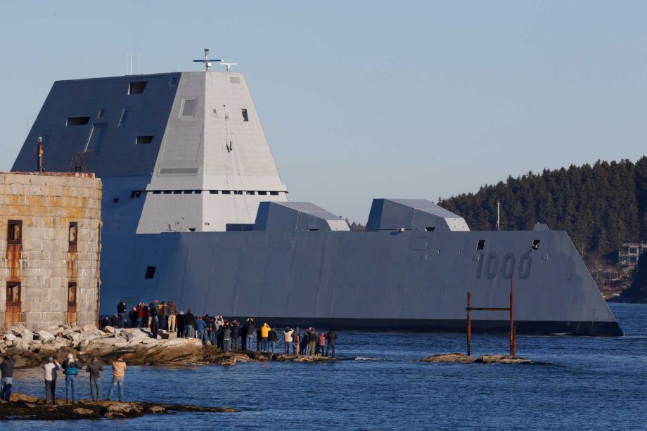 The first Zumwalt-class destroyer USS Zumwalt the largest ever built for the U.S. Navy ﻿heads out to sea Monday for testing passing more than 200 shipbuilders sailors and residents at Fort Popham at the mouth of the Kennebec River in Maine