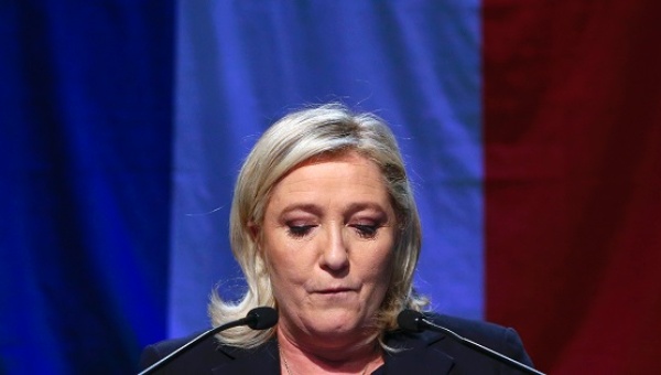 Marine Le Pen French National Front leader and candidate in the Nord-Pas-de-Calais-Picardie region delivers a speech after results in the second-round regional elections Dec. 13 2015