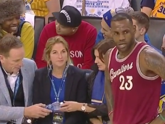 LeBron James catches woman heckling him  Le Bron James catches woman heckling him  less