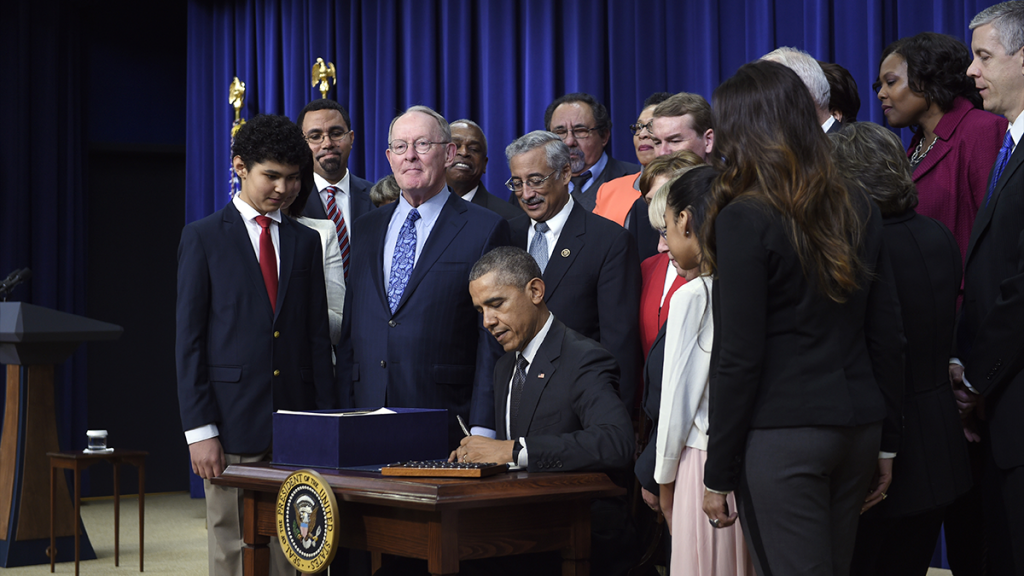 President Barack Obama signs the