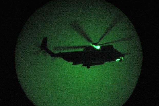 US military helicopter seen through night vision goggles