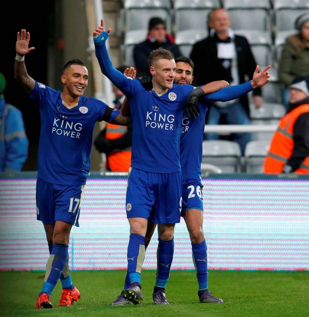 Leicester City's Jamie Vardy celebrates scoring against Newcastle last week with teammates Danny Simpson and Riyad Mahrez