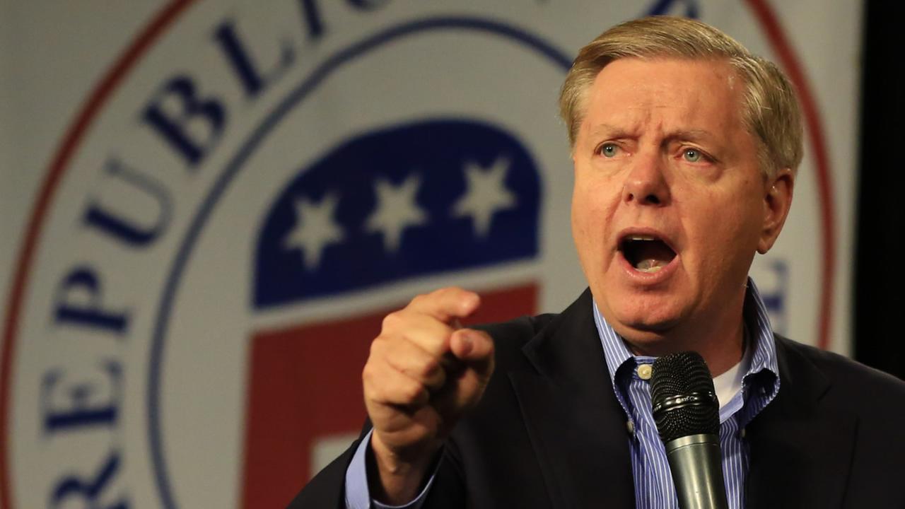 FILE Republican presidential candidate Sen. Lindsey Graham R-S.C. speaks at the Iowa GOPs Growth and Opportunity Party at the Iowa state fair grounds in Des Moines Iowa