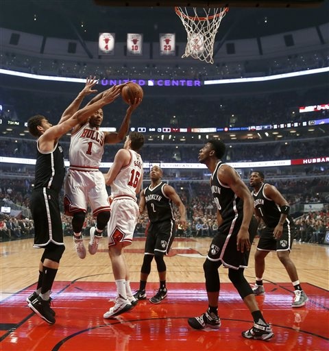 Lopez, Young lead Nets to 105-102 victory over Bulls