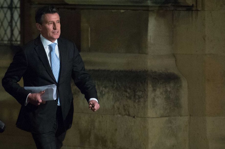 President of the International Association of Athletics Federations, Lord Coe leaves the Houses of Parliament in London after giving evidence to the Commons Culture Media and Sport Committee on blood-doping allegations Wednesday Dec. 2 2015. App