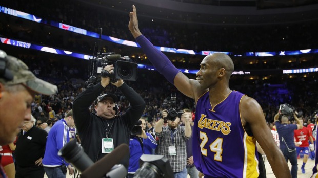 Los Angeles Lakers Kobe Bryant waves to the crowd after an NBA game against the Philadelphia 76ers