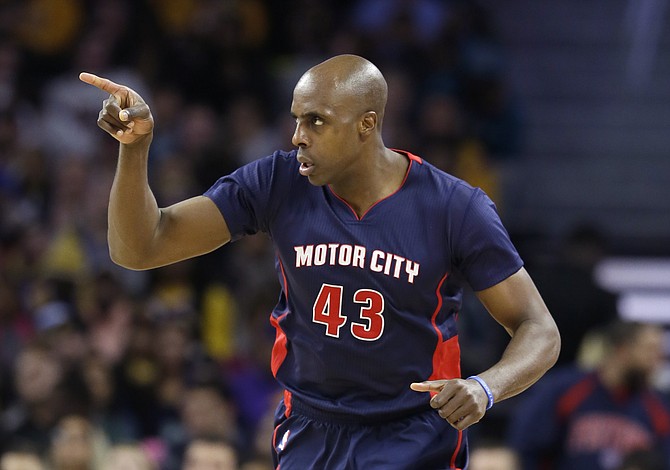 Detroit Pistons forward Anthony Tolliver points after a 3-point basket during the second half against the Los Angeles Lakers Sunday Dec. 6 2015 in Auburn Hills Mich. The Pistons defeated the Lakers 111-91