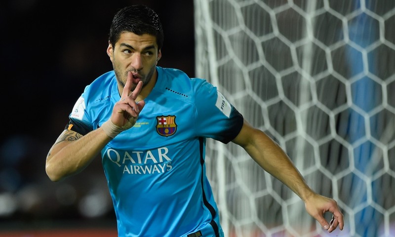 Luis Suarez celebrating the second of his three goals against Guangzhou Evergrande