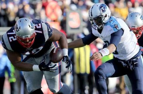 Akiem Hicks pounces on Titans quarterback Marcus Mariota’s fumble in the second quarter for his first NFL touchdown