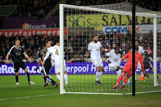 Mahrez second left scores his side's first goal of the game during the English Premier League soccer match between Leicester City and Swansea City at the Liberty Stadium Swansea Wales Saturday Dec. 5 2015. (Nick Potss