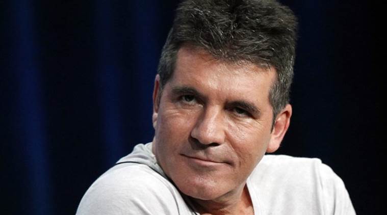 Simon Cowell Simon Cowell mansion burglary Simon Cowell tv star Simon Cowell music Simon Cowell girlfriend Lauren Silverman entertainment news