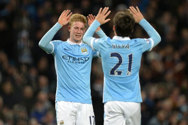 Kevin De Bruyne celebrates with David Silva after scoring the fourth goal for Manchester City