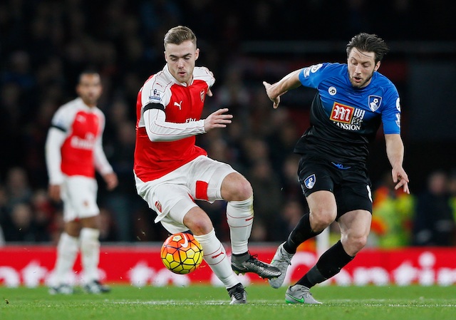 Arsenal's Calum Chambers and Bournemouth's Harry Arter in action. Reuters