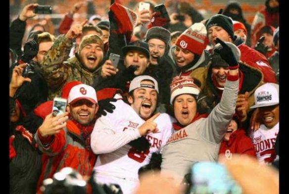 Mark J. Rebilas  USA Today 
    Oklahoma quarterback Baker Mayfield celebrates with Sooner fans after the Bedlam victory