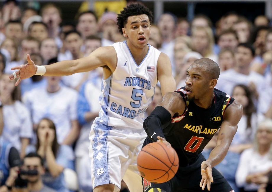 North Carolina's Marcus Paige guards Maryland's Rasheed Sulaimon during the first half of an NCAA college basketball game in Chapel Hill N.C. Tuesday Dec. 1 2015