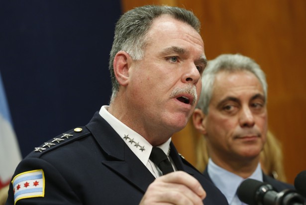 Mayor Rahm Emanuel looks on as Superintendent Garry Mc Carty speaks.         
                     M. Spencer Green  AP