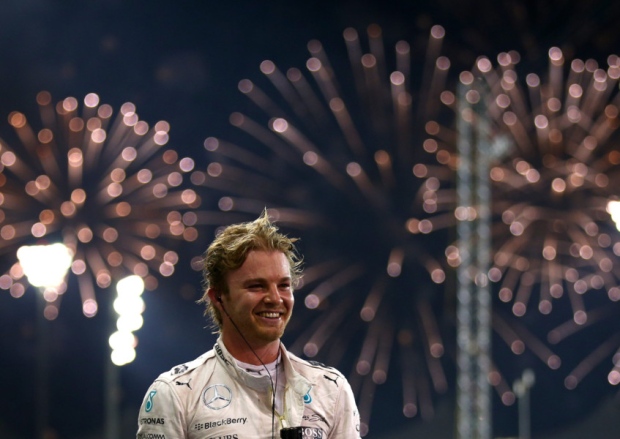 Mercedes driver Nico Rosberg celebrates after winning the Abu Dhabi GP at the Yas Marina Circuit