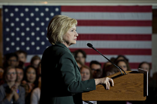 Hillary Clinton 2016 presidential candidate pauses while speaking at an event with Warren Buffett chairman and chief executive officer of Berkshire Hathaway Inc. Sokol Auditorium in Omaha Neb. Dec. 16 2015