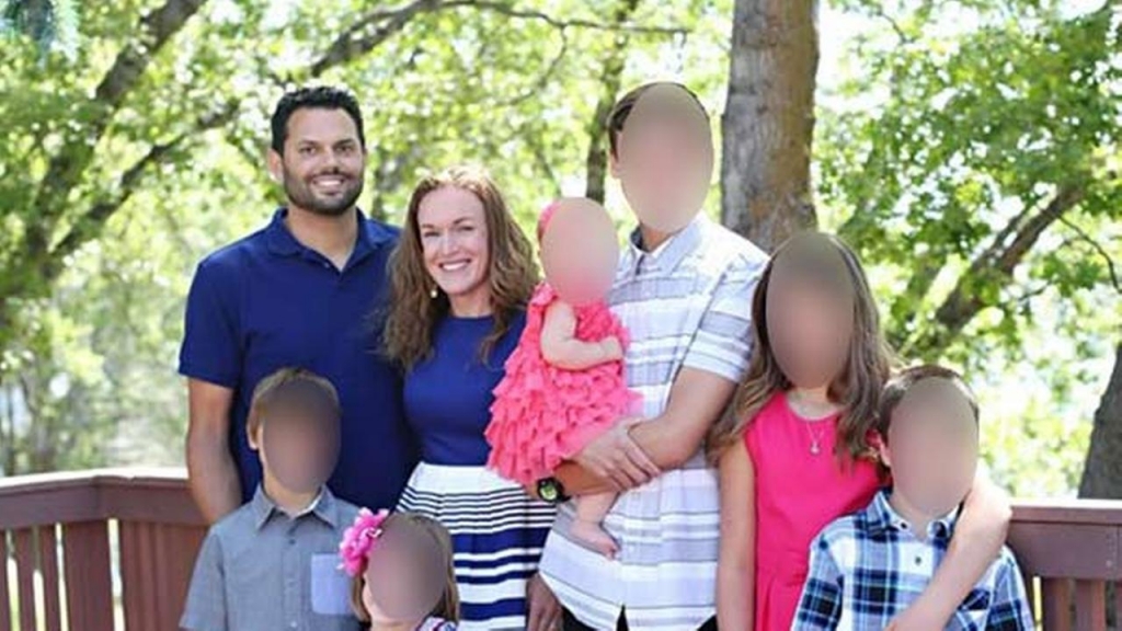 Michael Wetzel is seen with his wife and six children in this