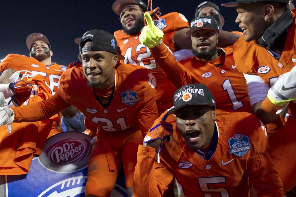 Dec 5 2015 Charlotte NC USA The Clemson Tigers celebrate after defeating the North Carolina Tar Heels 45-37 in the ACC football championship game at Bank of America Stadium. Mandatory Credit Joshua S. Kelly-USA TODAY Sports