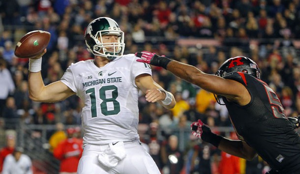 Oct 10 2015 Piscataway NJ USA Rutgers Scarlet Knights linebacker Quentin Gause puts pressure on Michigan State Spartans quarterback Connor Cook during the second quarter at High Points Solutions Stadium. Mandatory Credit Jim O'Connor-USA