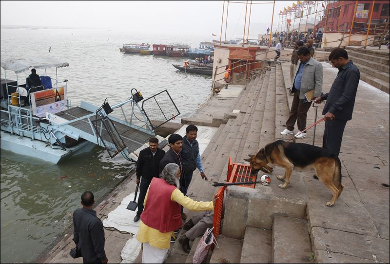 A dog squad carries out a security drill on the Ghats of the Ganges River ahead of Japanese Prime Minister Shinzo Abe's visit in Varanasi India today