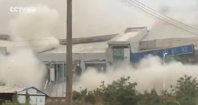 Watch terrifying moment landslide reduces 4-storey building to rubble in seconds