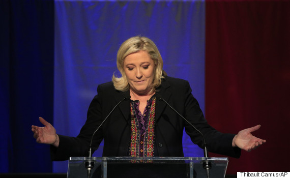 France's Le Pen takes flak for tweeting grisly IS pics