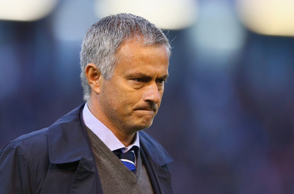 BURNLEY ENGLAND- AUGUST 18 Chelsea manager Jose Mourinho walks to the dug out prior to the Barclays Premier League match between Burnley and Chelsea at Turf Moor