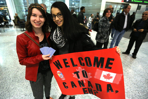 Syrian refugees headed to Canada on first planeload