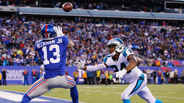 New York Giants receiver Odell Beckham Jr. scores a game-tying touchdown as Carolina Panthers defensive back Josh Norman tries to defend