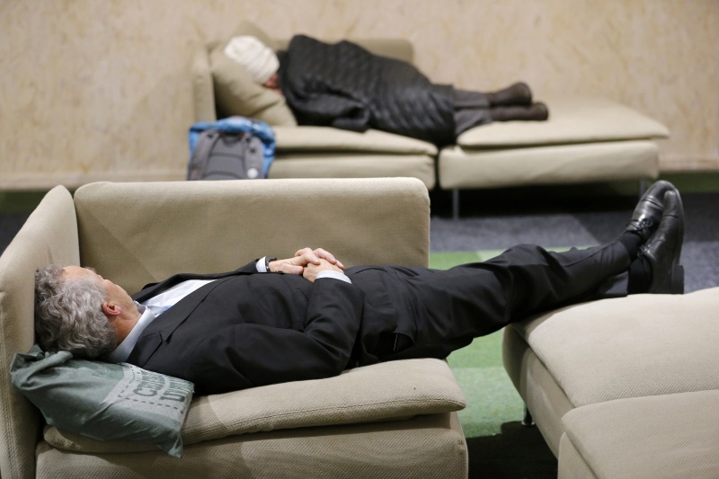 Participants take a break during the climate conference