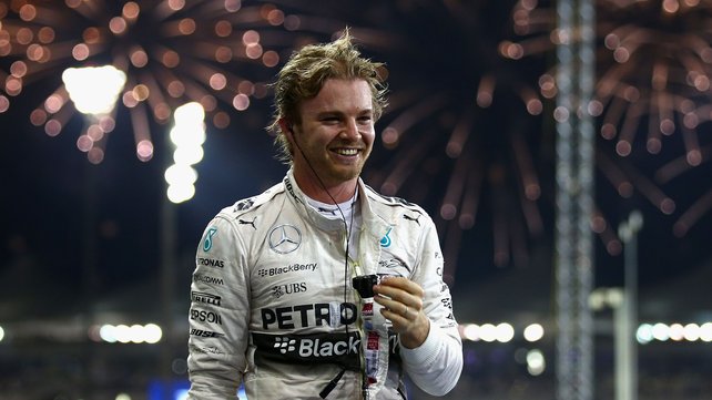 Nico Rosberg of Germany and Mercedes GP celebrates in Parc Ferme after winning the Abu Dhabi Formula One Grand Prix