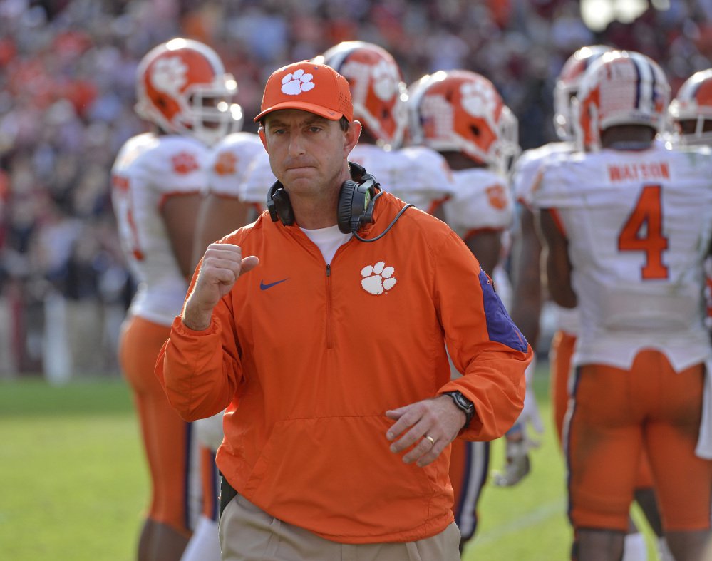 Clemson head coach Dabo Swinney reacts in the closing minutes of a game against South Carolina earlier this season in Columbia S.C. Swinney and the Tigers earned the No. 1 seed in the College Football Playoffs