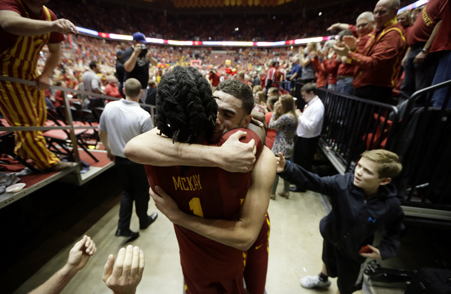 Reporter Randy Peterson broke his leg as fans stormed the court following a dramatic late victory. Iowa State forward Georges Niang